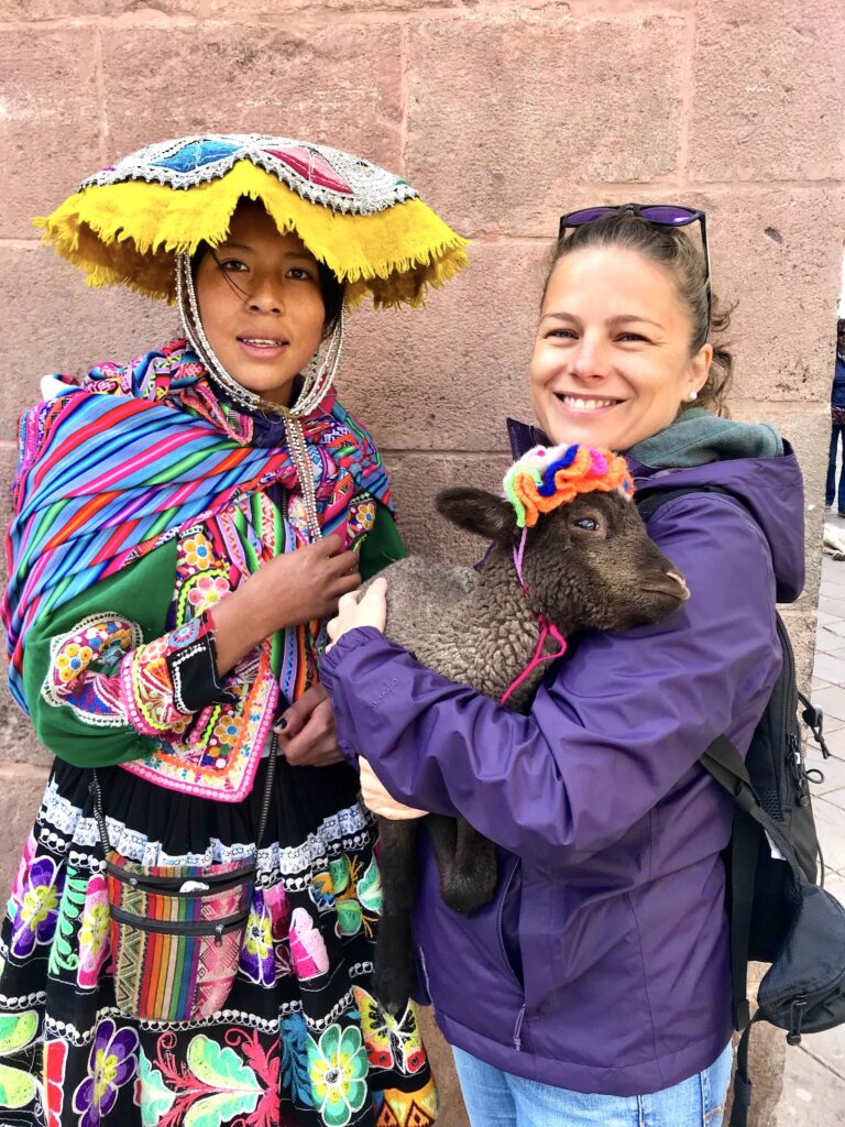 Andean woman and her lamb